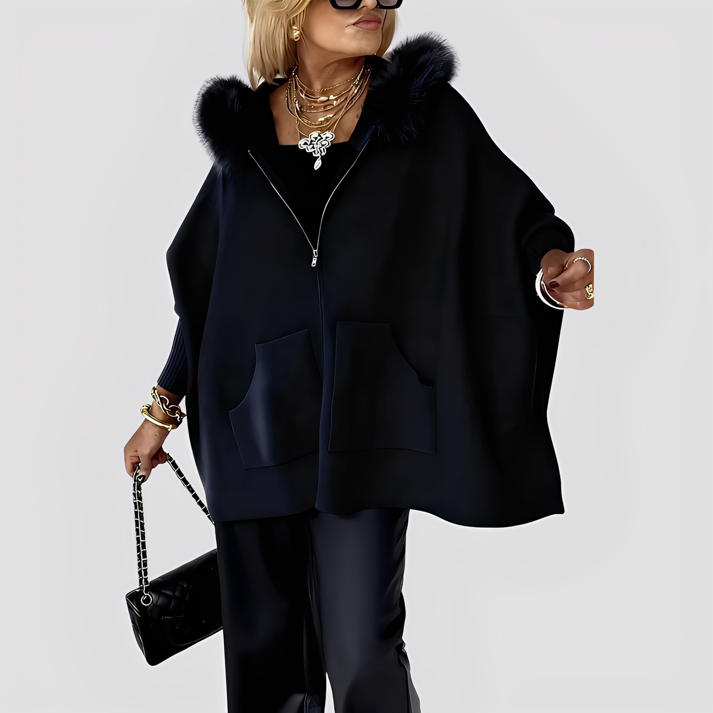 Elvena - Moderní kabát s umělou kožešinou a kapucí pro ženy